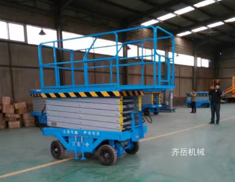 可（kě）伸（shēn）縮台麵移動式升降機